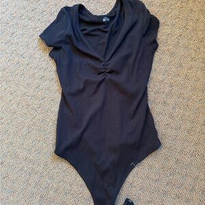 Black Ribbed One-Piece Bodysuit